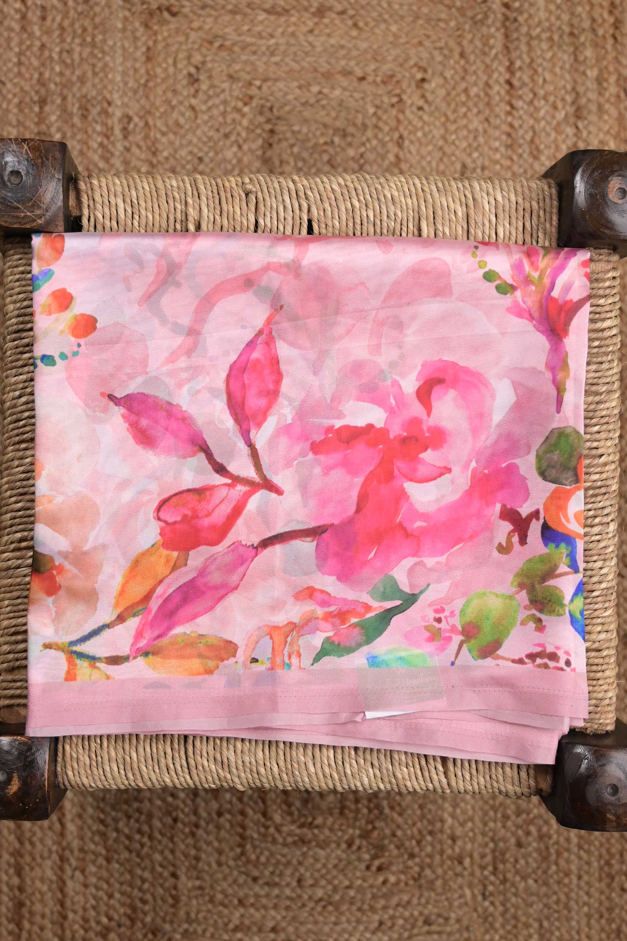 Soya silk saree peach color with allover multi color floral prints, small contrast border and plain blouse