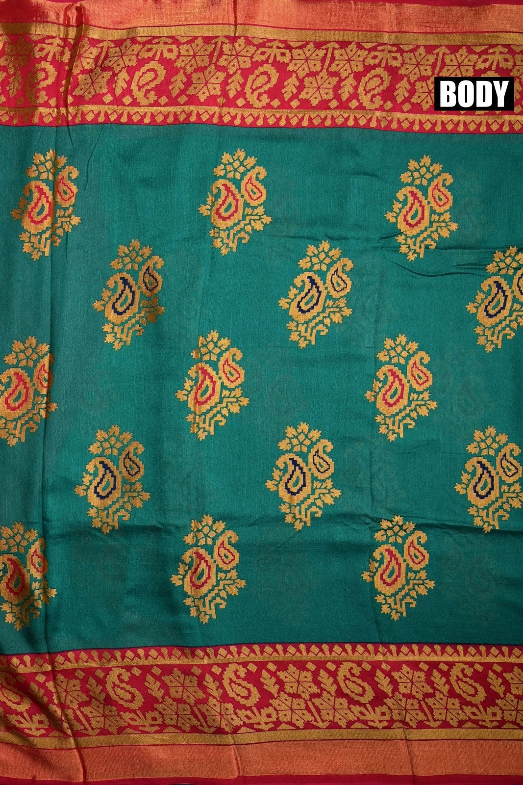 Soft jute saree green and red color allover prints with contrast border and brocade blouse