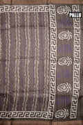 Jute tussar fancy grey color allover prints & small printed kaddi border with attached printed blouse