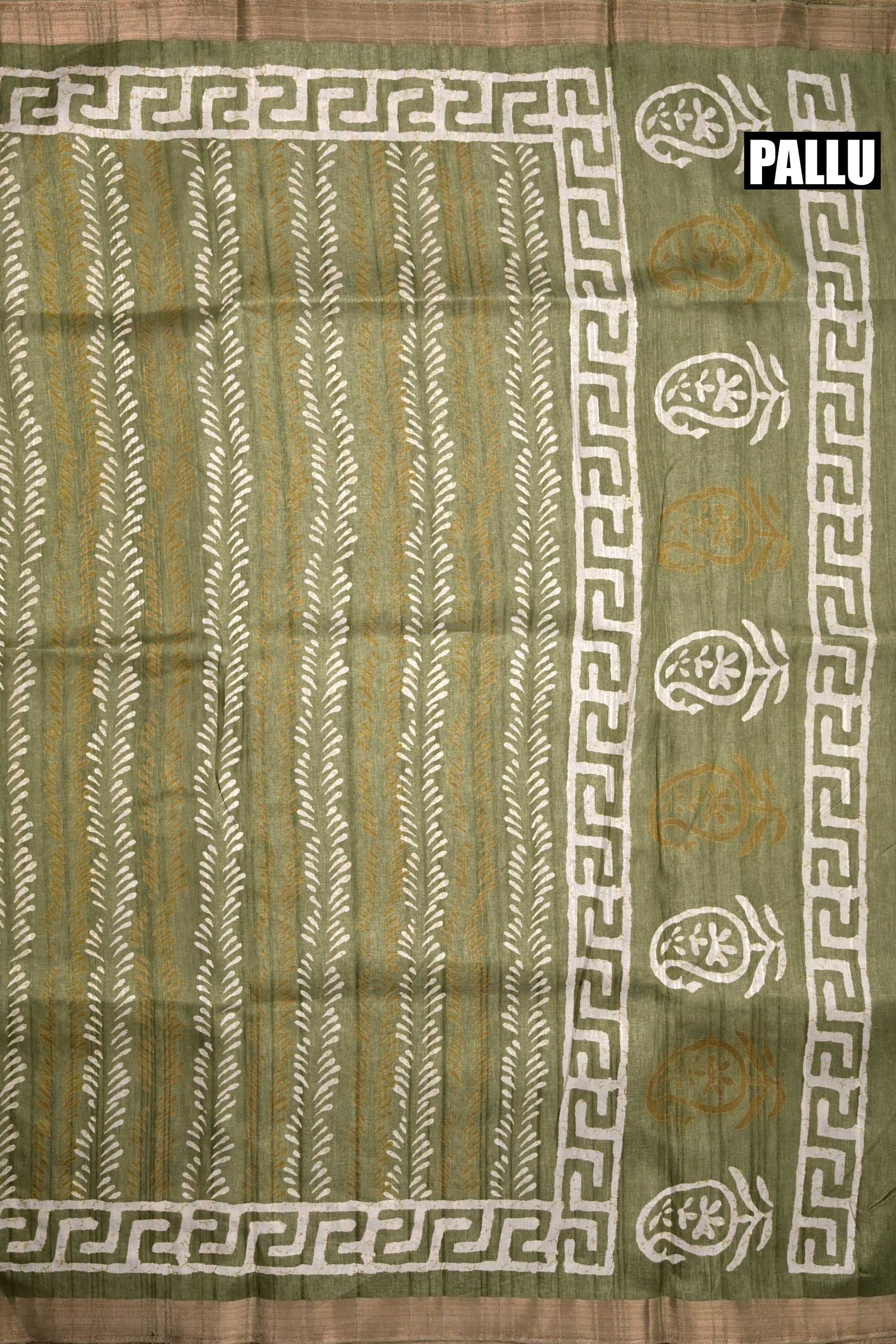 Jute tussar fancy sea green color allover prints & small printed kaddi border with attached printed blouse