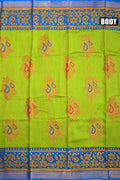 Soft jute saree green and blue color allover prints with contrast border and brocade blouse