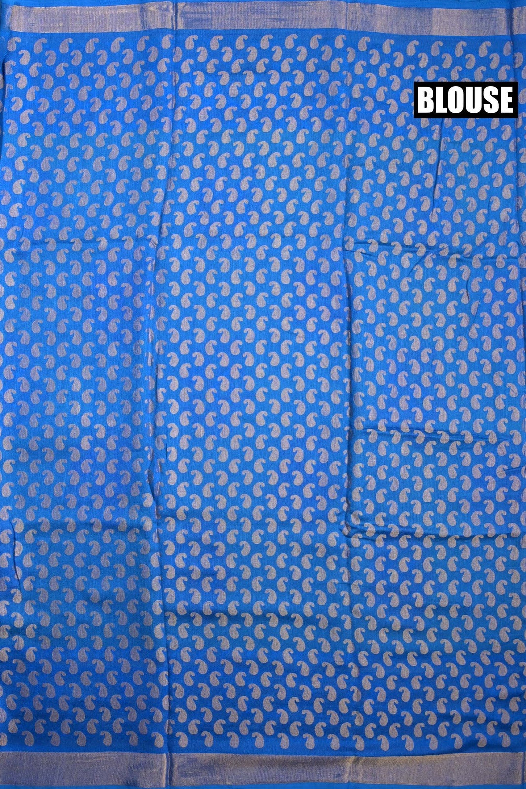 Soft jute saree green and blue color allover prints with contrast border and brocade blouse