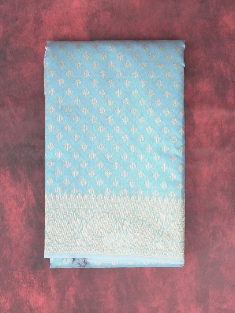 Chanderi fancy saree light blue color with allover small zari motive weaves, small gold zari border, short pallu with attached plain blouse