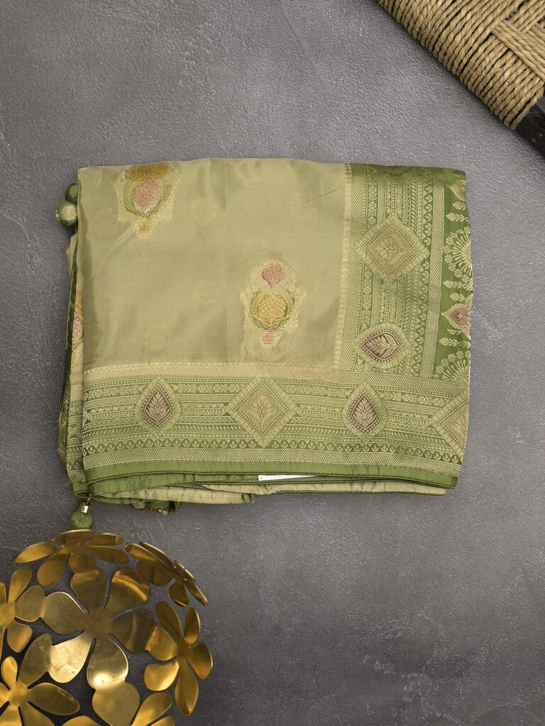 Dola silk fancy saree cream color allover prints & zari border with printed pallu and attached blouse