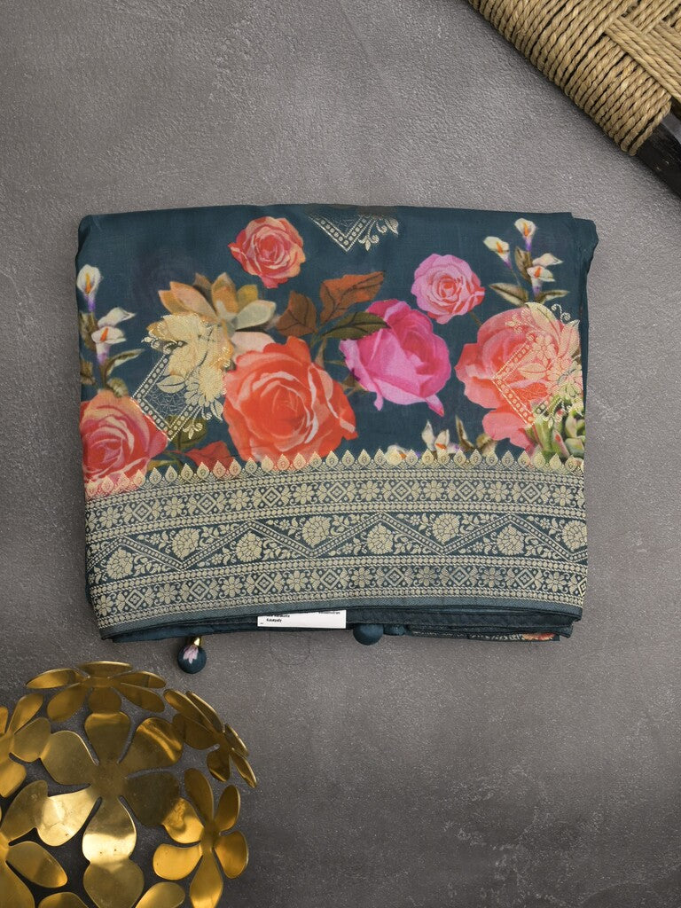 Dola silk fancy saree navy blue color allover prints & zari border with printed pallu and attached blouse