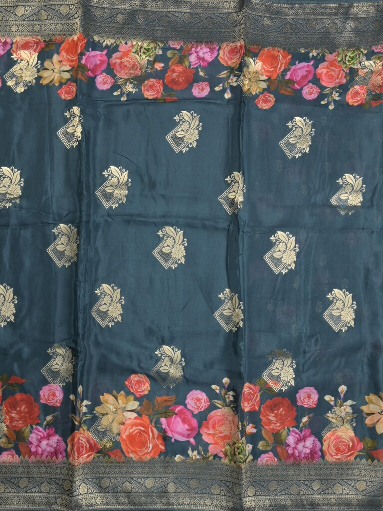 Dola silk fancy saree navy blue color allover prints & zari border with printed pallu and attached blouse