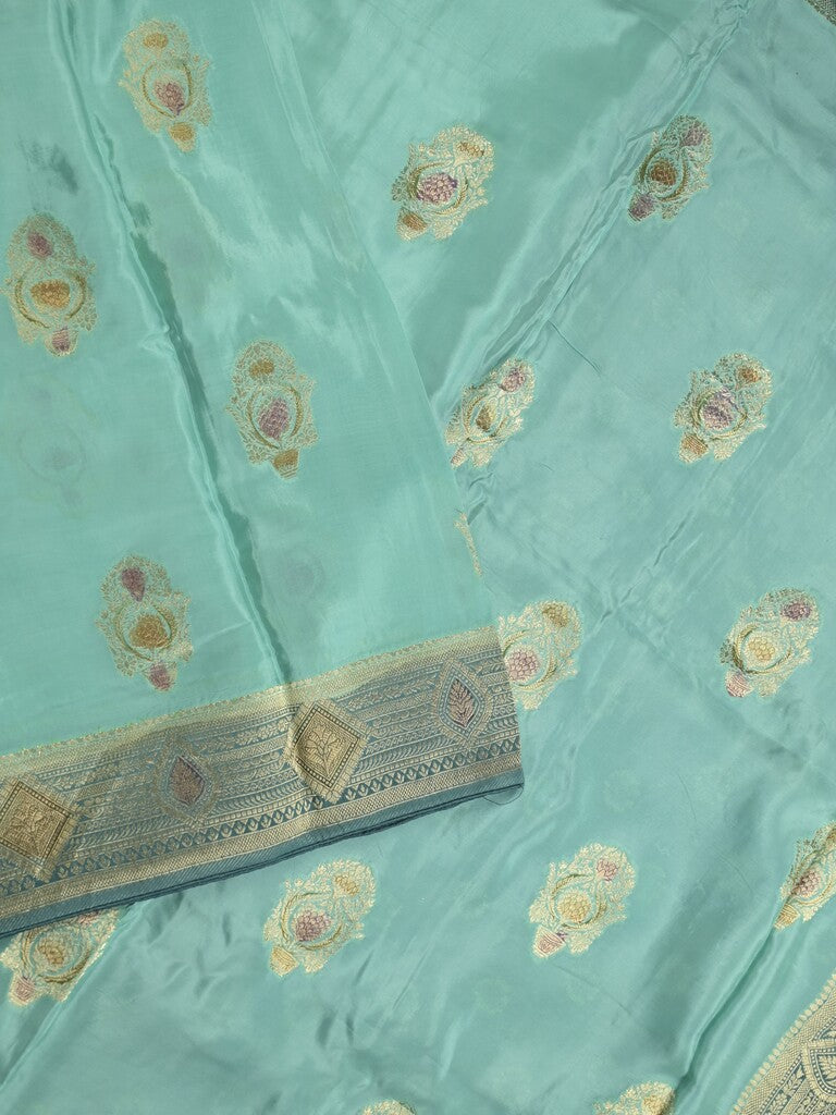 Dola silk fancy saree sky blue color allover prints & zari border with printed pallu and attached blouse