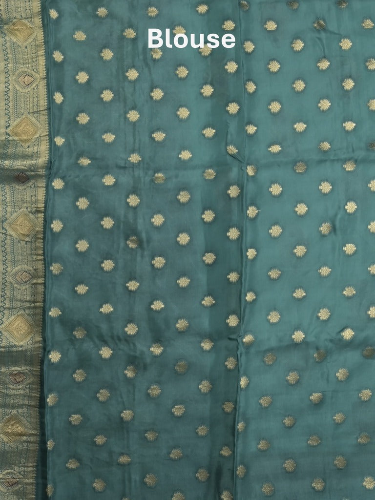 Dola silk fancy saree sky blue color allover prints & zari border with printed pallu and attached blouse