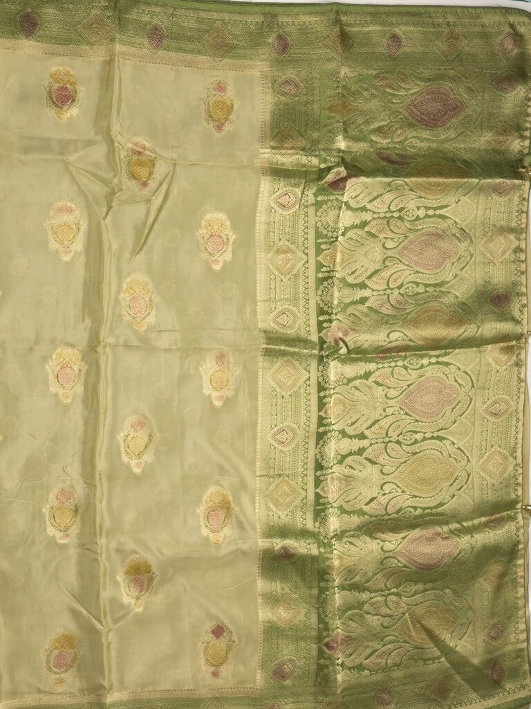 Dola silk fancy saree cream color allover prints & zari border with printed pallu and attached blouse