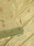 Dola silk fancy saree cream color allover prints & zari border with printed pallu and attached blouse