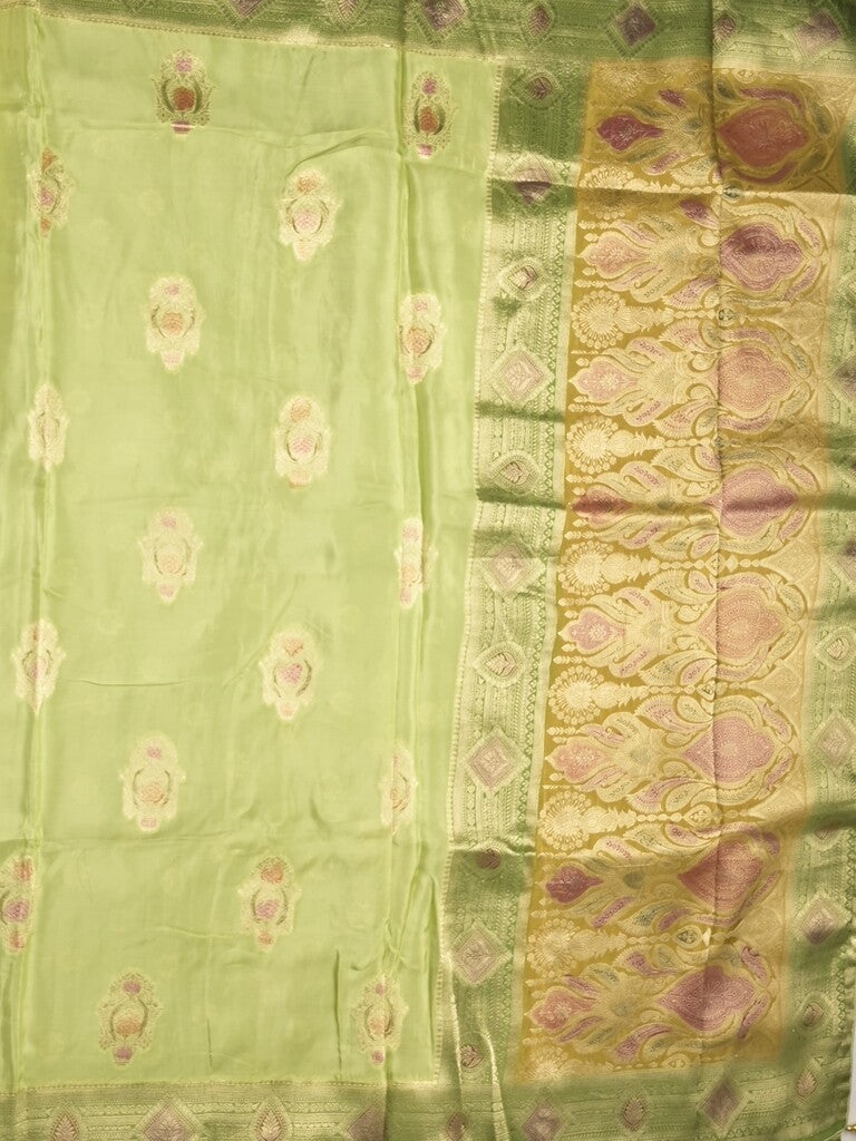 Dola silk fancy saree pista green color allover prints & zari border with printed pallu and attached blouse