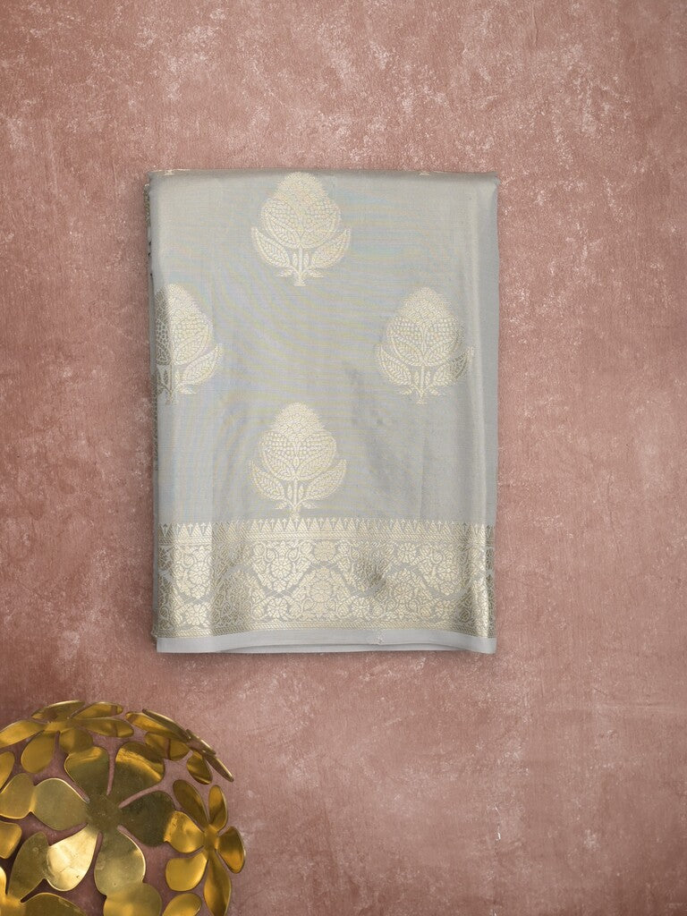 Banaras tissue fancy saree light grey color allover weaves & zari border with rich pallu and self blouse