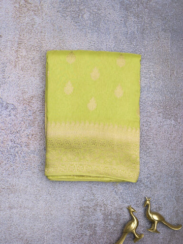 Tabby silk fancy saree parrot green color allover zari motifs & zari border with rich pallu and plain blouse