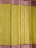 Banaras tissue fancy saree greenish yellow color allover weaves & zari border with running pallu and self blouse