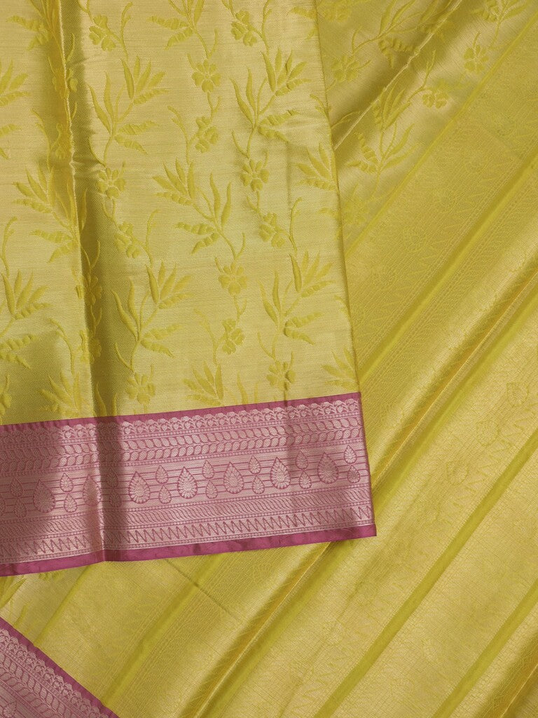 Banaras tissue fancy saree greenish yellow color allover weaves & zari border with running pallu and self blouse