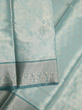 Banaras tissue fancy saree light blue color allover weaves & zari border with running pallu and self blouse