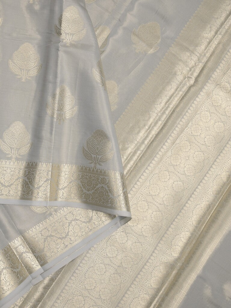 Banaras tissue fancy saree light grey color allover weaves & zari border with rich pallu and self blouse