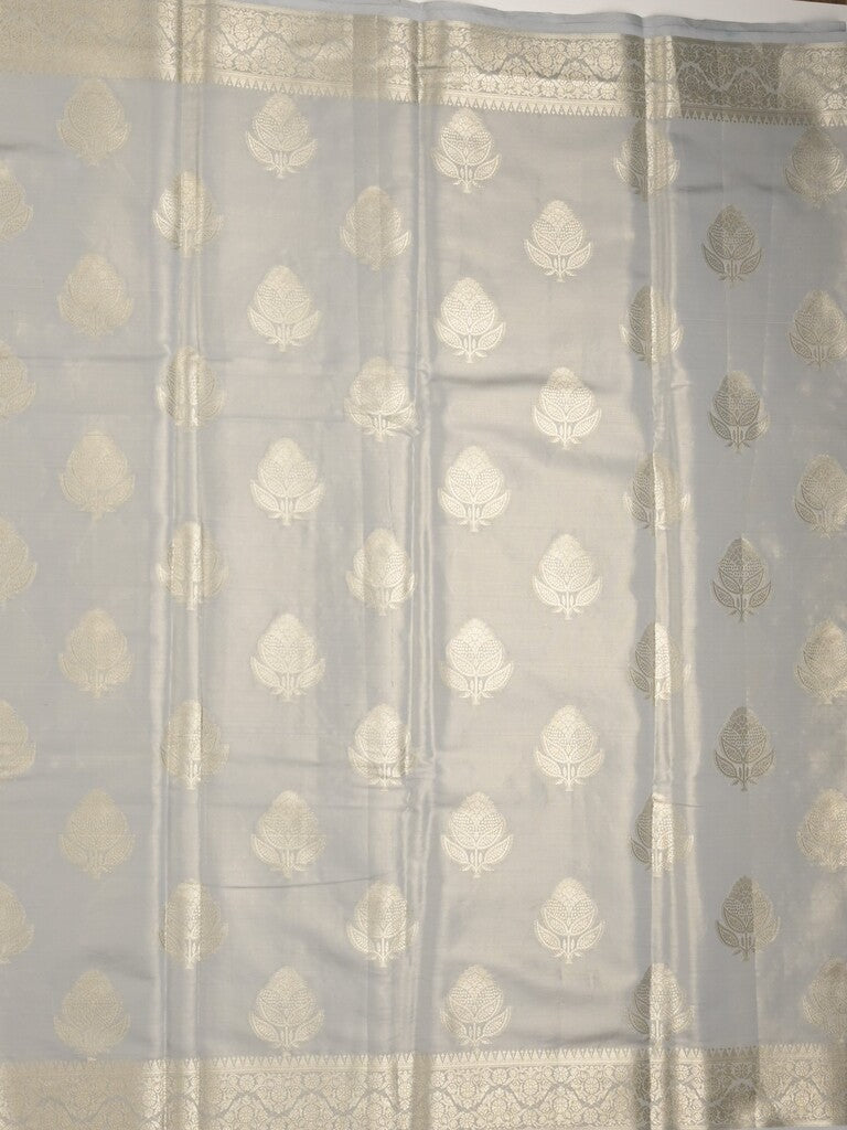 Banaras tissue fancy saree light grey color allover weaves & zari border with rich pallu and self blouse