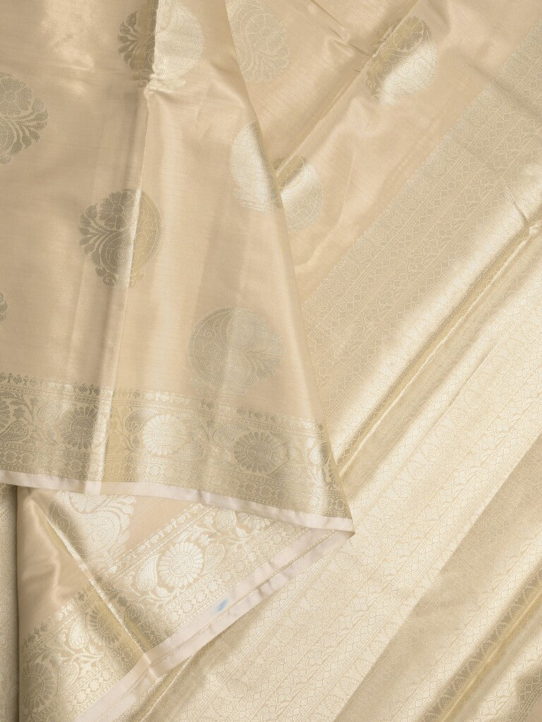 Banaras tissue fancy saree beige color allover weaves & zari border with rich pallu and self blouse