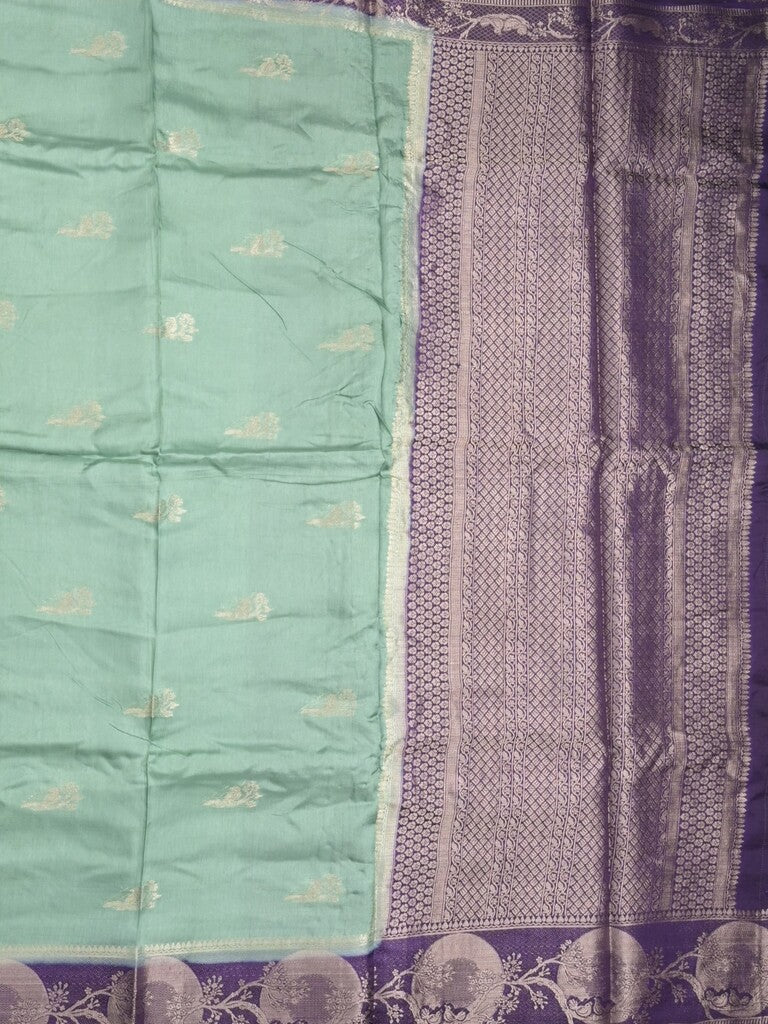 Tabby silk fancy saree sea blue color allover zari motifs & zari border with rich pallu and contrast blouse