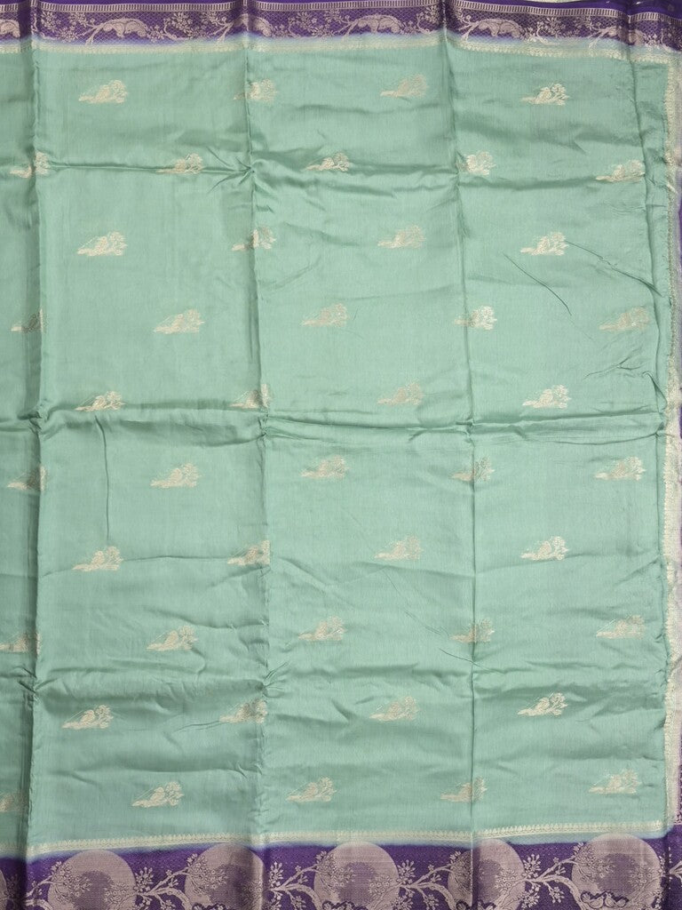 Tabby silk fancy saree sea blue color allover zari motifs & zari border with rich pallu and contrast blouse