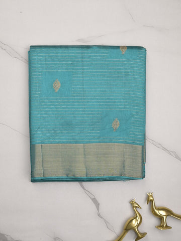 Dupion fancy saree sky blue color allover zari motifs & zari border with zari pallu and contrast plain blouse