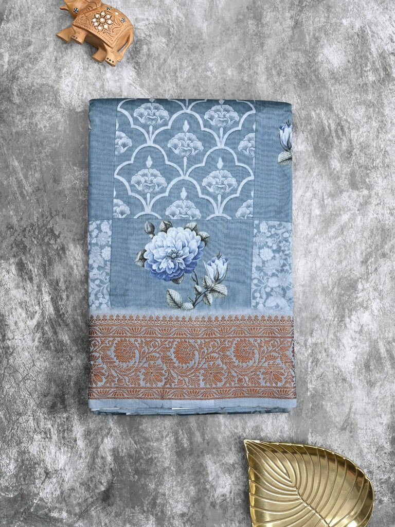 Chanderi fancy saree sky blue color allover prints & zari border with short pallu and printed blouse