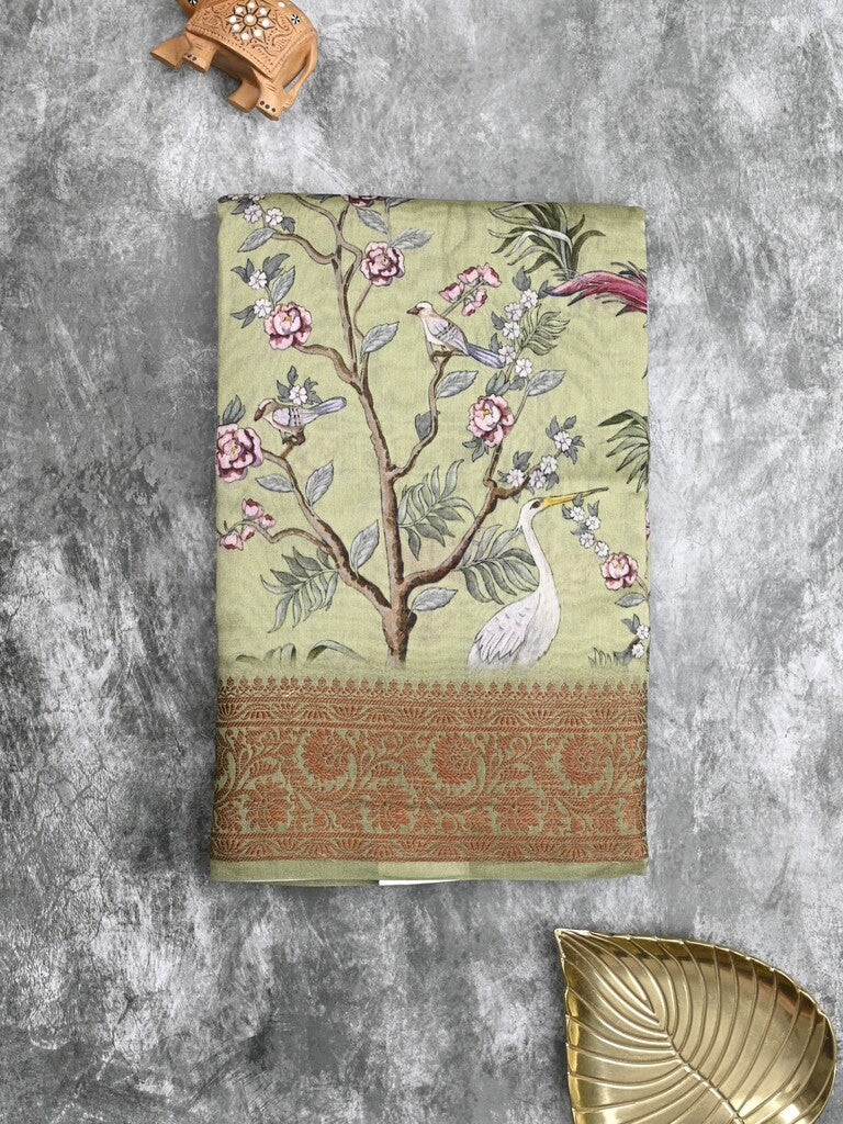 Chanderi fancy saree light pista green color allover prints & zari border with short pallu and printed blouse