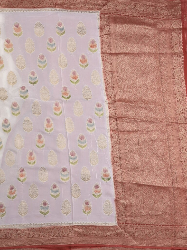 Georgette fancy saree white color allover zari motifs & zari border with zari pallu and contrast plain blouse