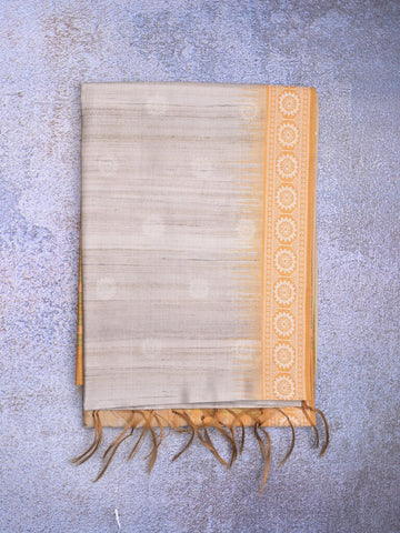 Tussar fancy saree light grey color allover motifs & weaving border with contrast pallu and attached blouse