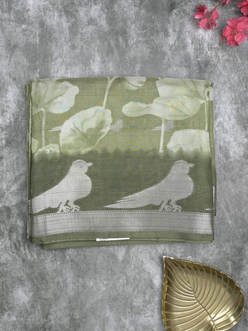 Dola silk fancy saree olive green color allover prints & contrast zari border with printed pallu and printed blouse