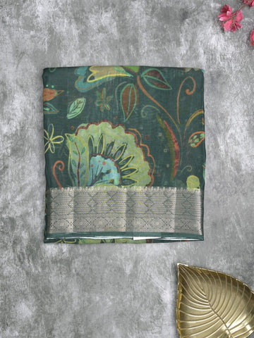Georgette fancy saree dark green color allover prints & zari border with zari pallu and plain blouse
