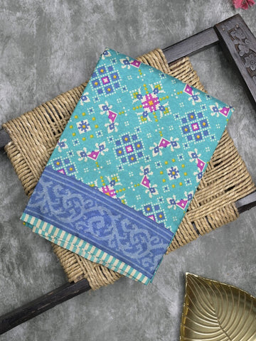 Crape fancy saree sky blue color allover prints & contrast border with printed pallu and attached plain blouse