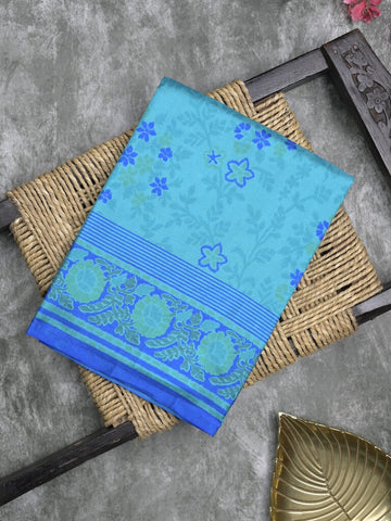 Crape fancy saree sky blue color allover prints & contrast border with printed pallu and attached plain blouse