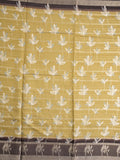 Dola silk fancy saree light mustard yellow color allover prints & contrast zari border with printed pallu and printed blouse