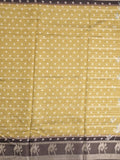 Dola silk fancy saree light mustard yellow color allover prints & contrast zari border with printed pallu and printed blouse