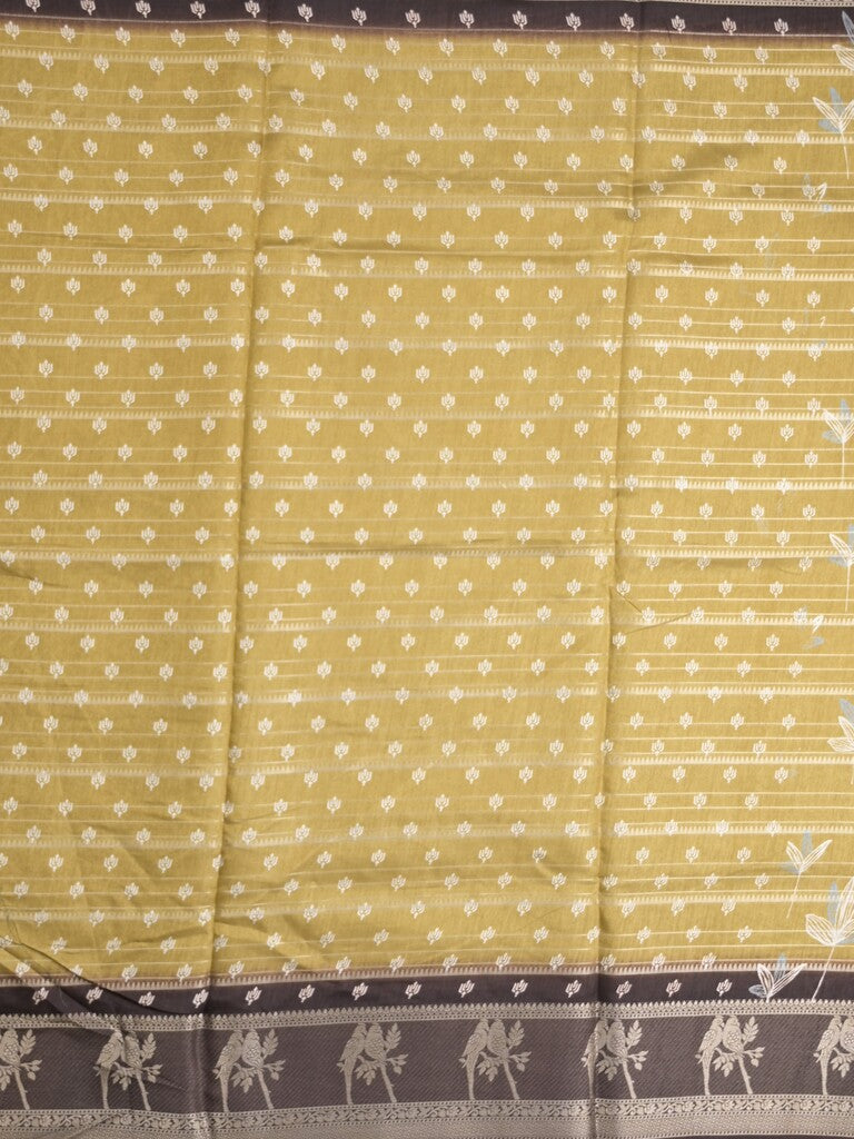 Dola silk fancy saree light mustard yellow color allover prints & contrast zari border with printed pallu and printed blouse