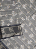 Dola silk fancy saree grey color allover prints & contrast zari border with printed pallu and printed blouse