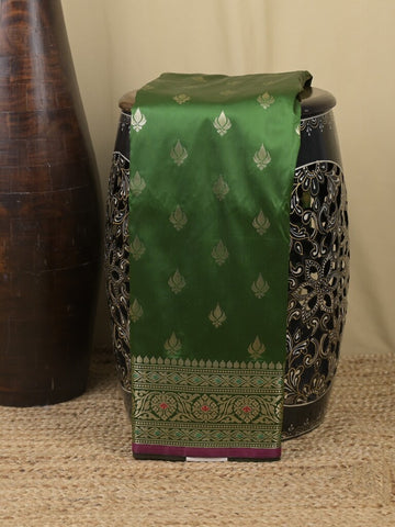 Banaras fancy saree bottle green color allover zari motifs & zari border with rich contrast pallu and plain blouse