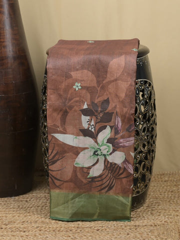 Tussar fancy saree brown color allover prints & small kaddi border with printed pallu and attached contrast plain blouse