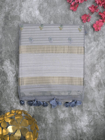 Tussar fancy saree grey color allover prints & small kaddi border with printed pallu and attached plain blouse