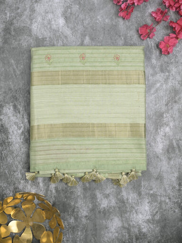 Tussar fancy saree light pista green color allover prints & small kaddi border with printed pallu and attached plain blouse