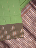 Kanchi pattu saree leaf green color allover zari weaves & zari border with contrast pallu and plain contrast blouse