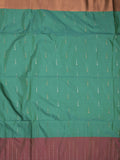 Kanchi pattu saree peacock green color allover zari weaves & zari border with contrast pallu and plain contrast blouse