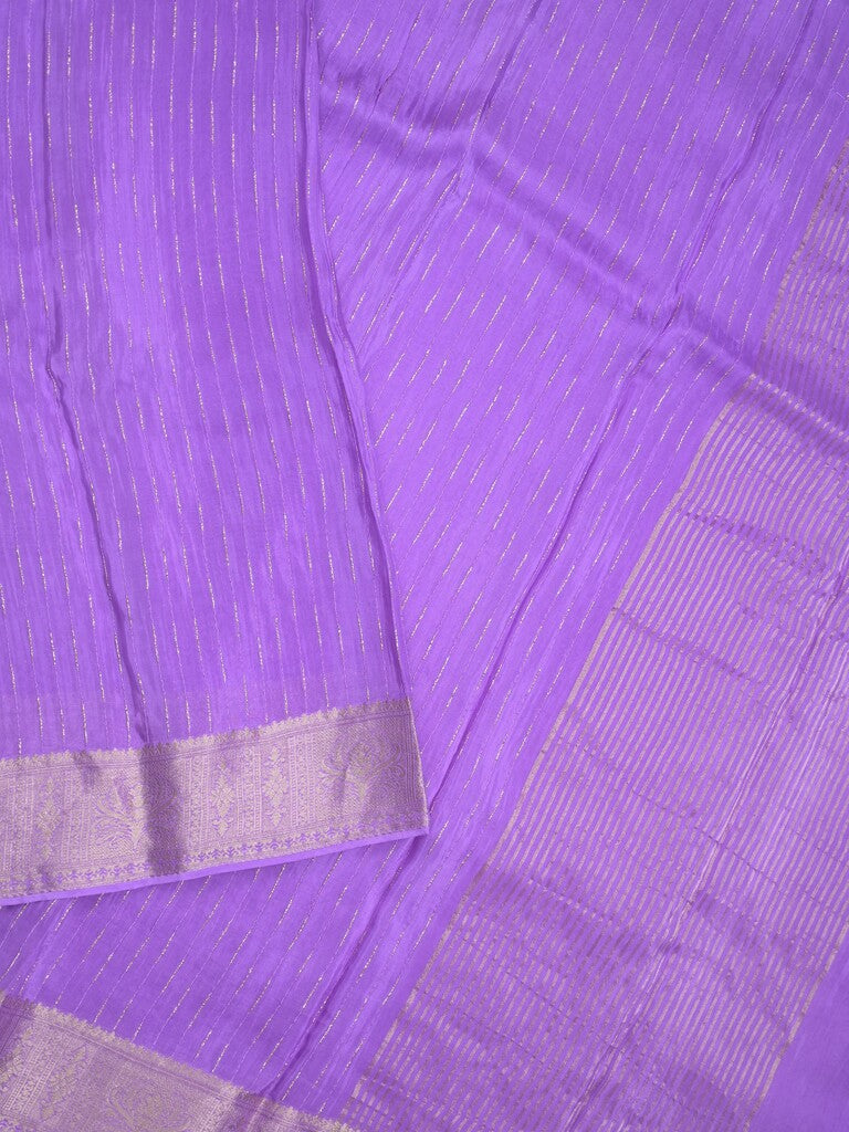 Organza fancy saree lavender color allover weaves & zari border with short pallu and plain contrast blouse