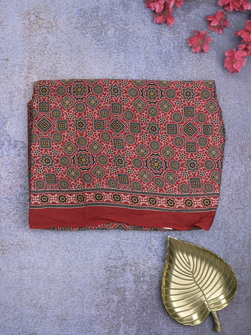 Modal silk fancy saree red color allover prints & small kaddi border with zari pallu and printed blouse
