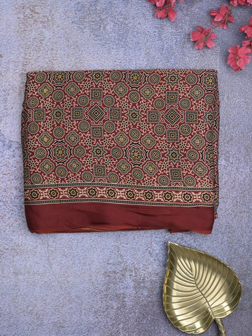 Modal silk fancy saree maroon color allover prints & small kaddi border with zari pallu and printed blouse