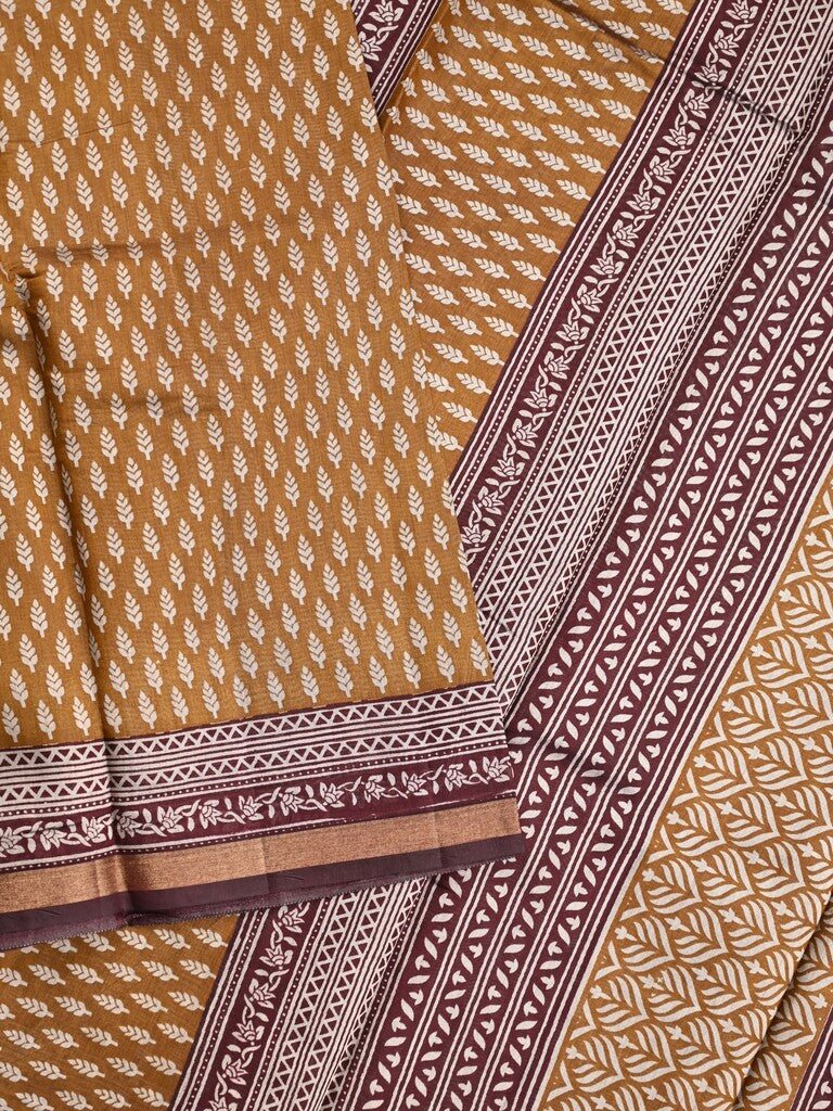 Maheshwari fancy saree mustard yellow color allover prints & printed zari border with contrast pallu and attached blouse