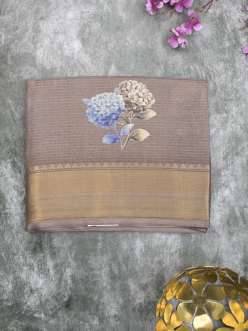 Dola silk fancy saree grey color allover prints & zari border with short pallu and printed self blouse