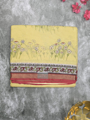 Kota fancy fancy saree light yellow color allover prints & zari border with printed pallu and contrast plain blouse